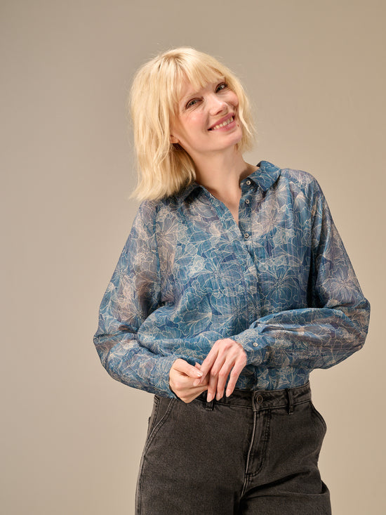 Blusa con abbottonatura
