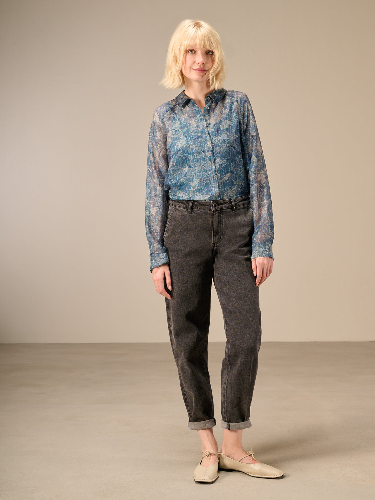 Blusa con abbottonatura