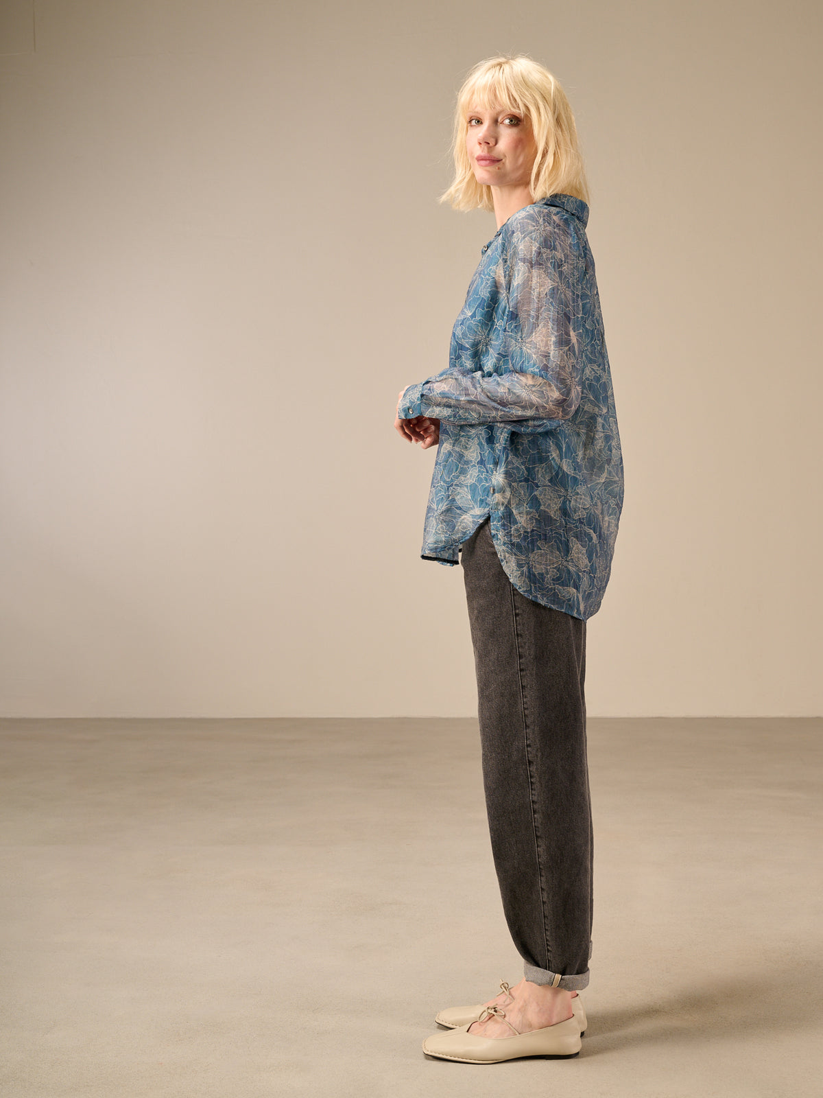 Blusa con abbottonatura