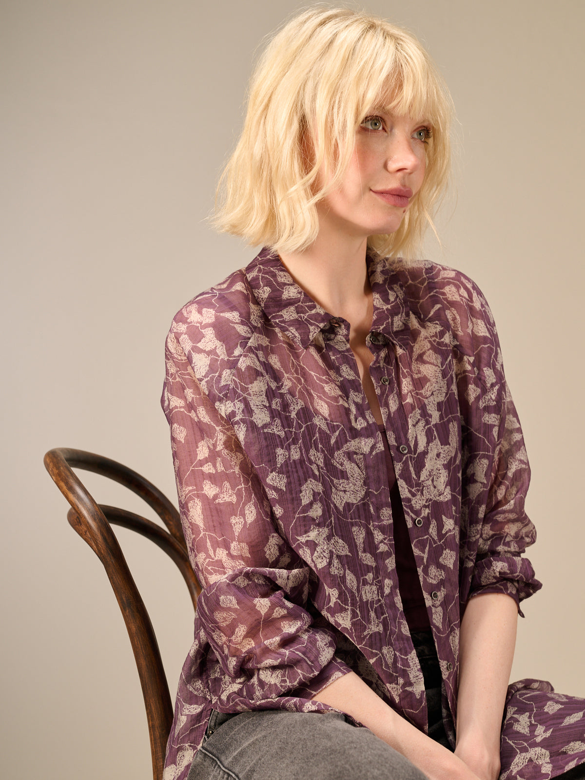 Blusa con abbottonatura