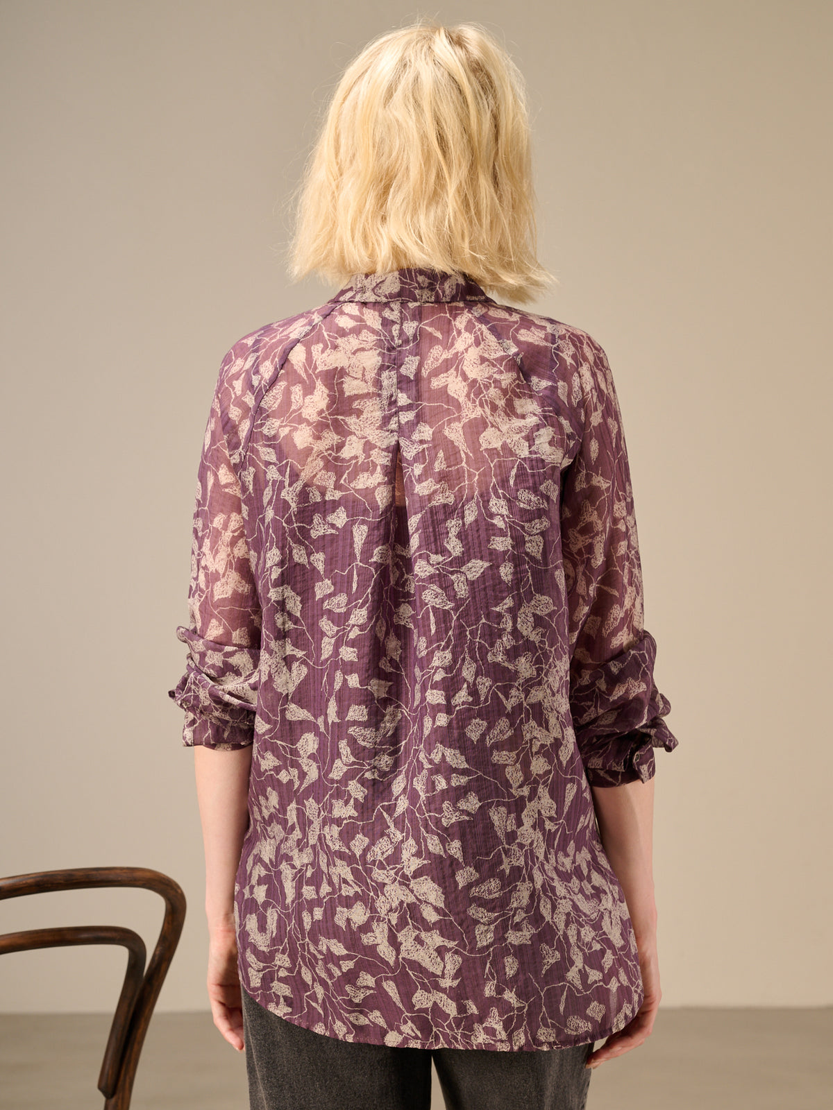 Blusa con abbottonatura
