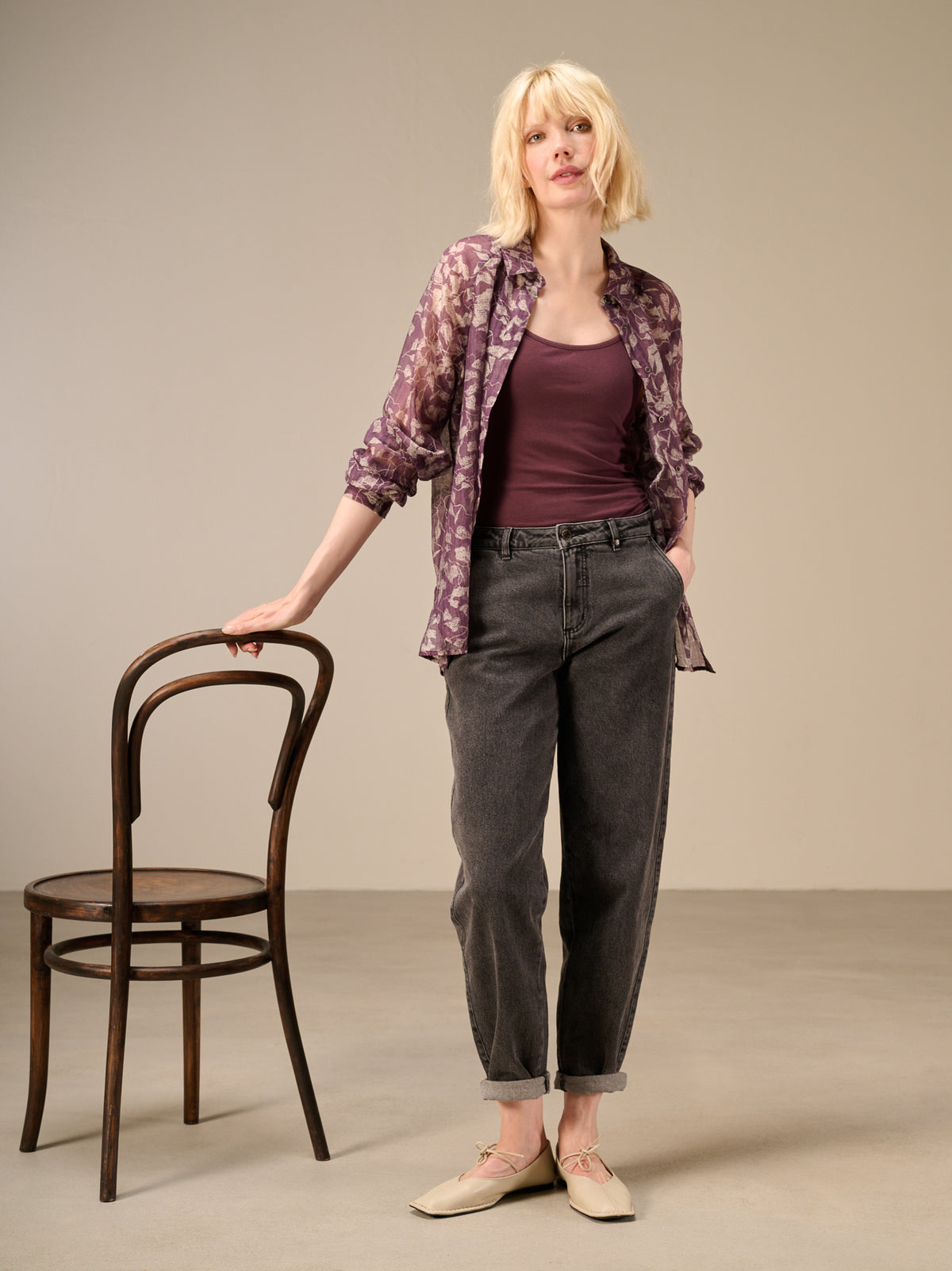 Blusa con abbottonatura