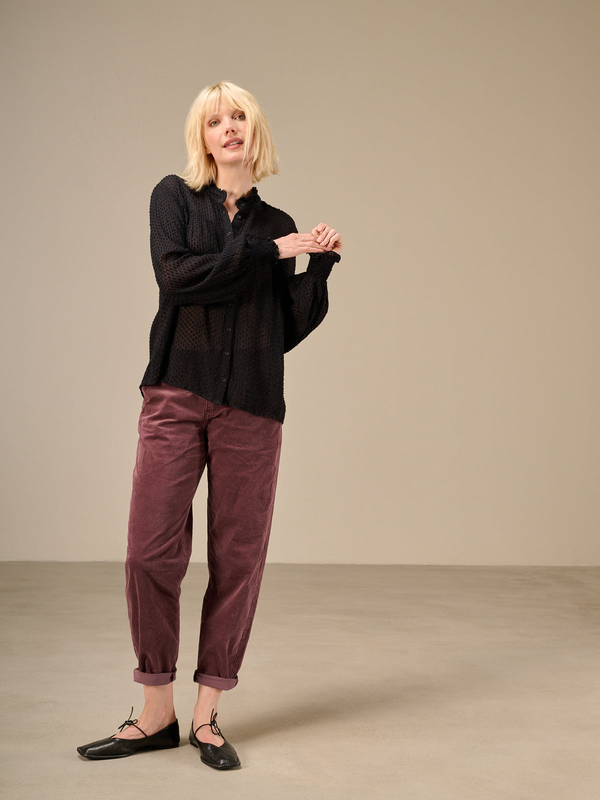 Blusa con dettaglio a balze