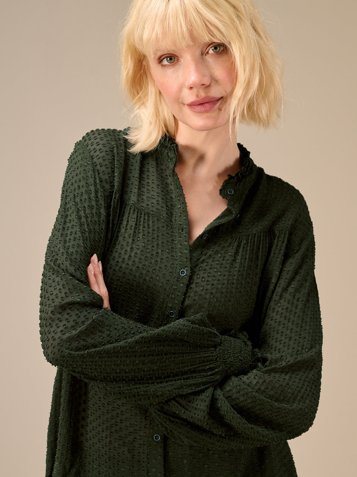 Blusa con dettaglio a balze