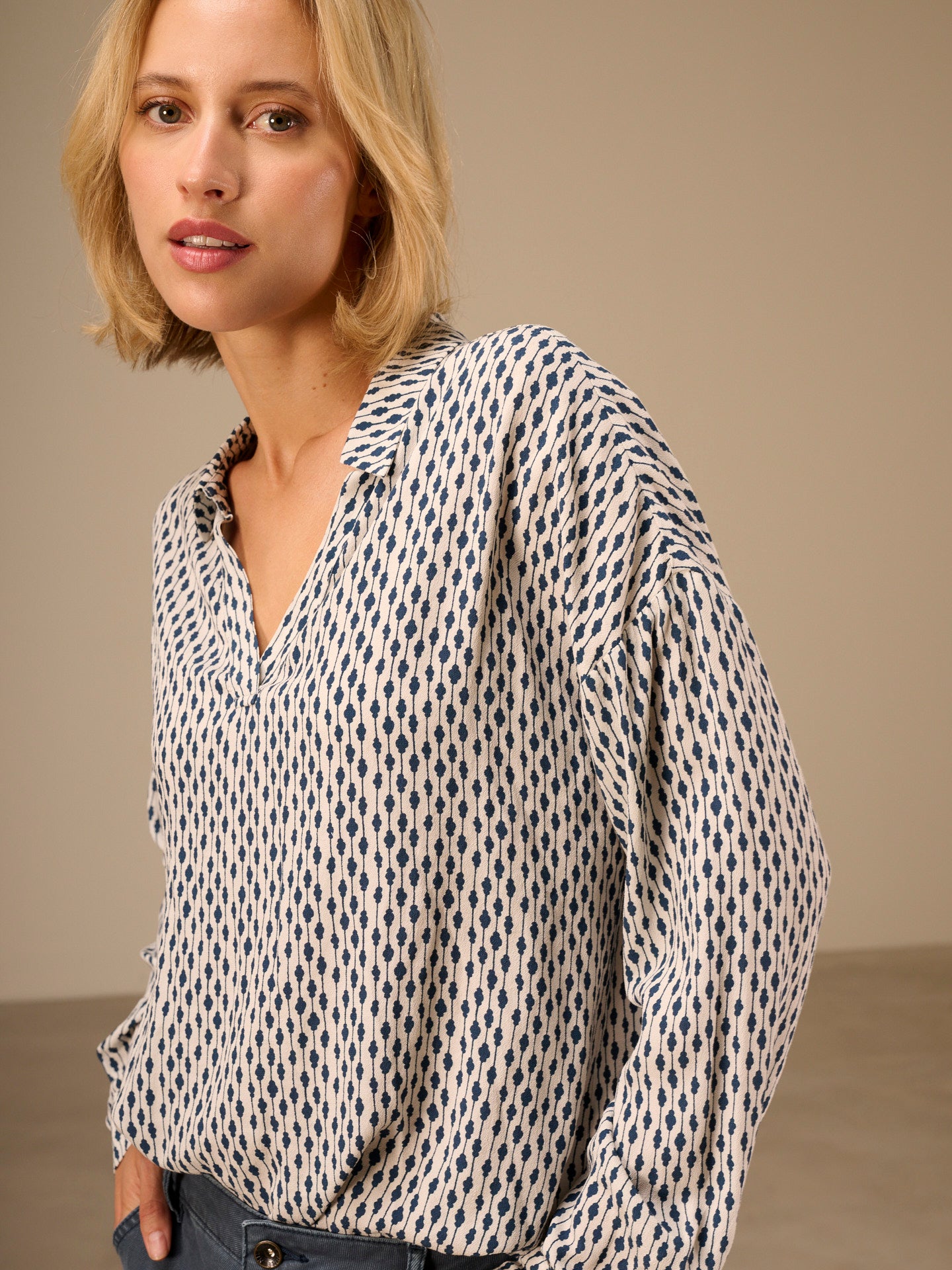 Blusa con maniche a 3/4