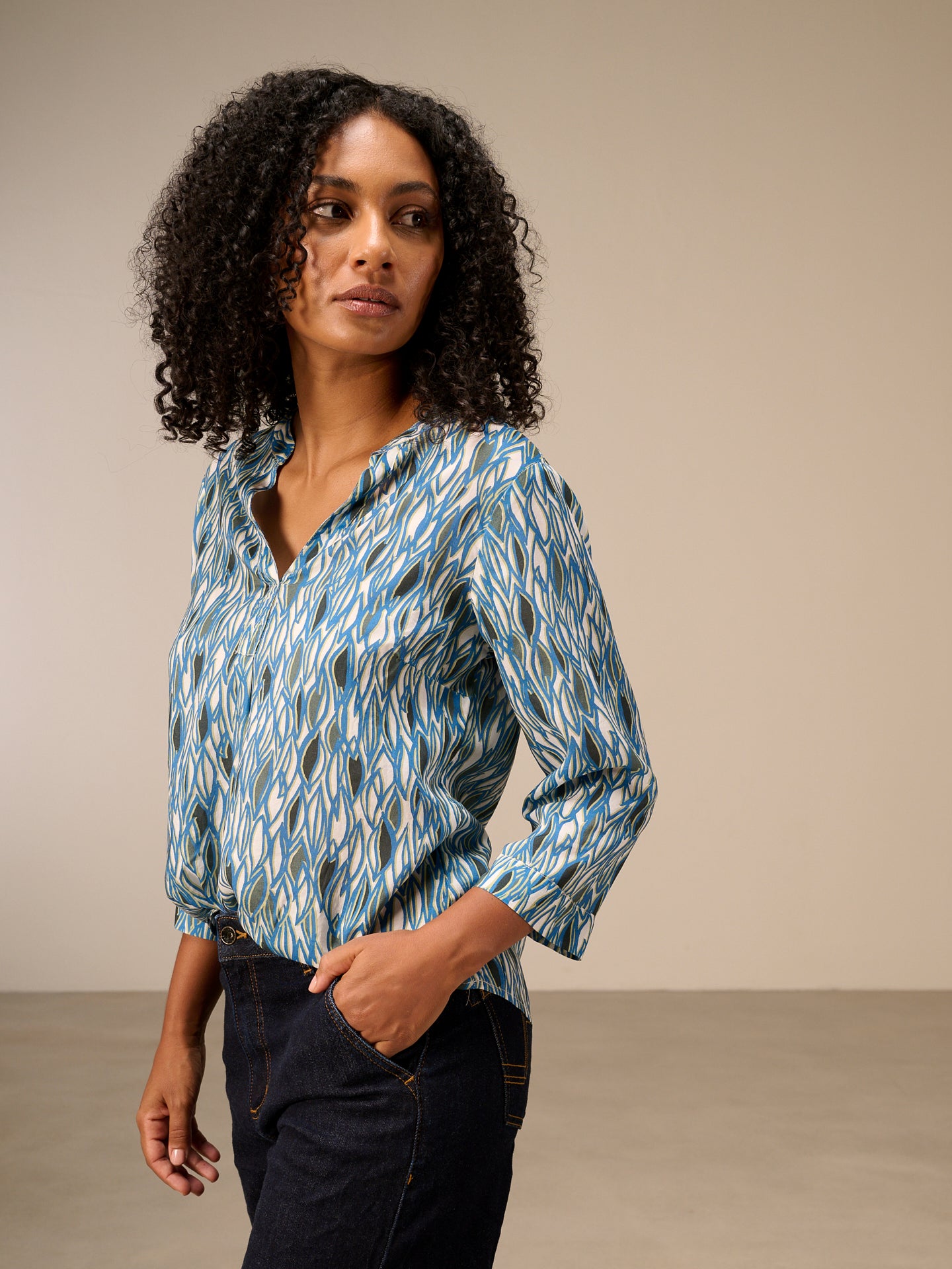 Blouse with stand-up collar
