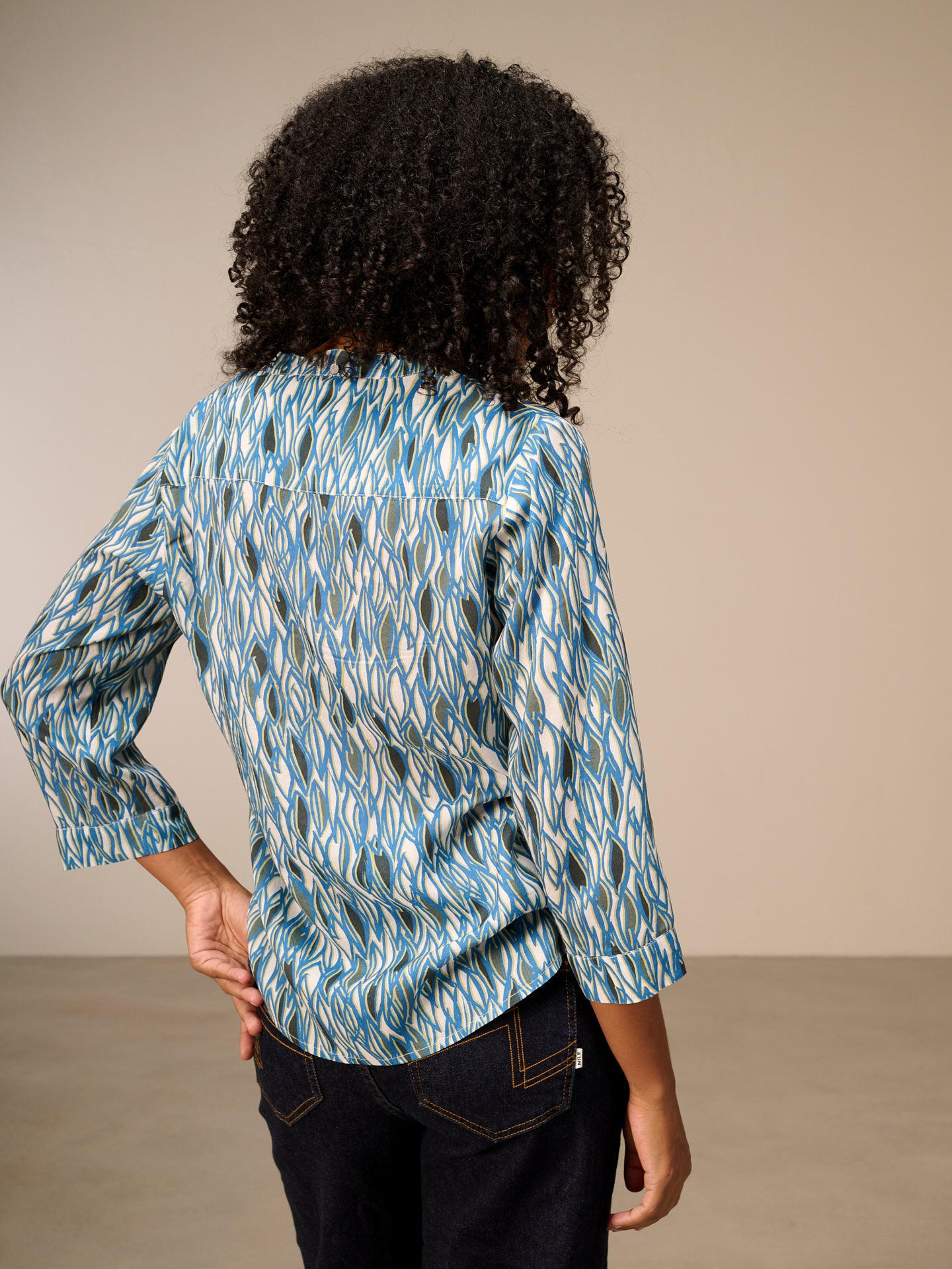 Blouse with stand-up collar