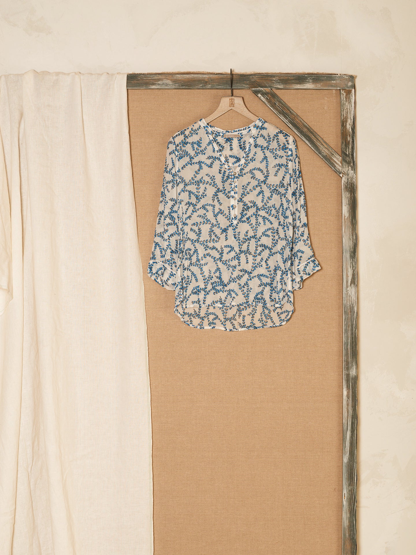 Blusa con abbottonatura