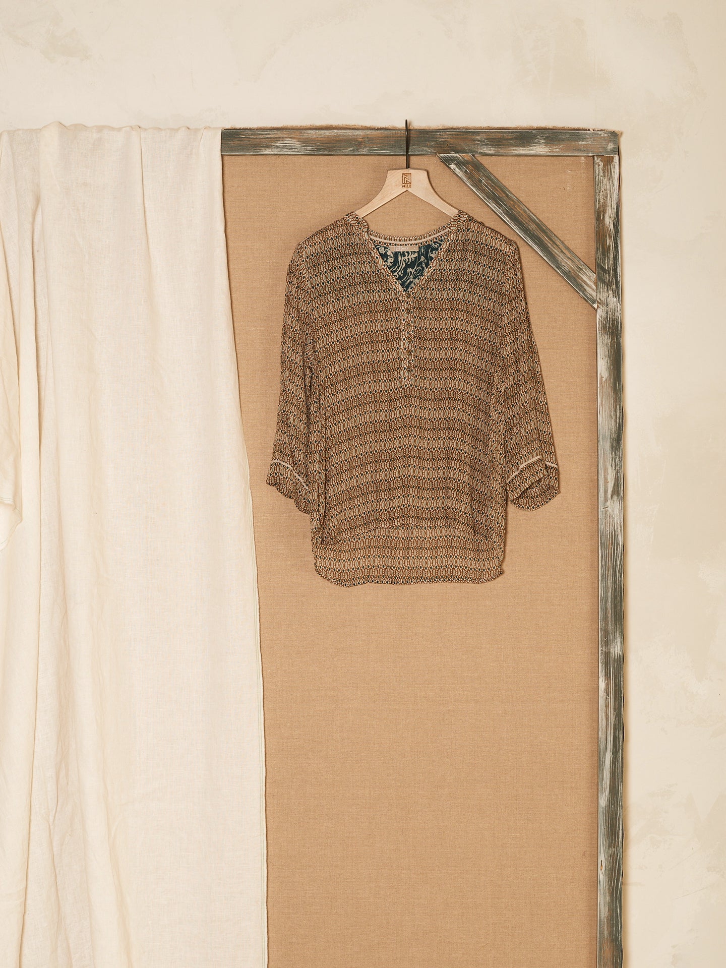 Blusa con abbottonatura