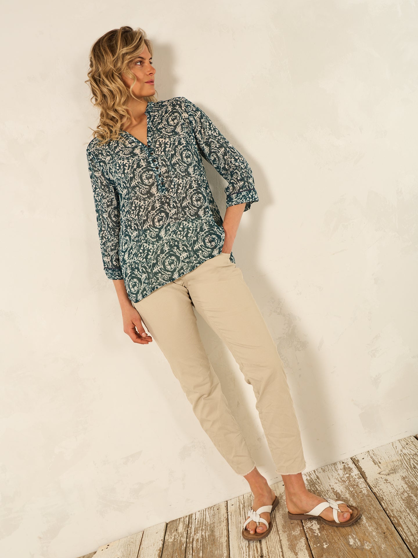 Blusa con abbottonatura