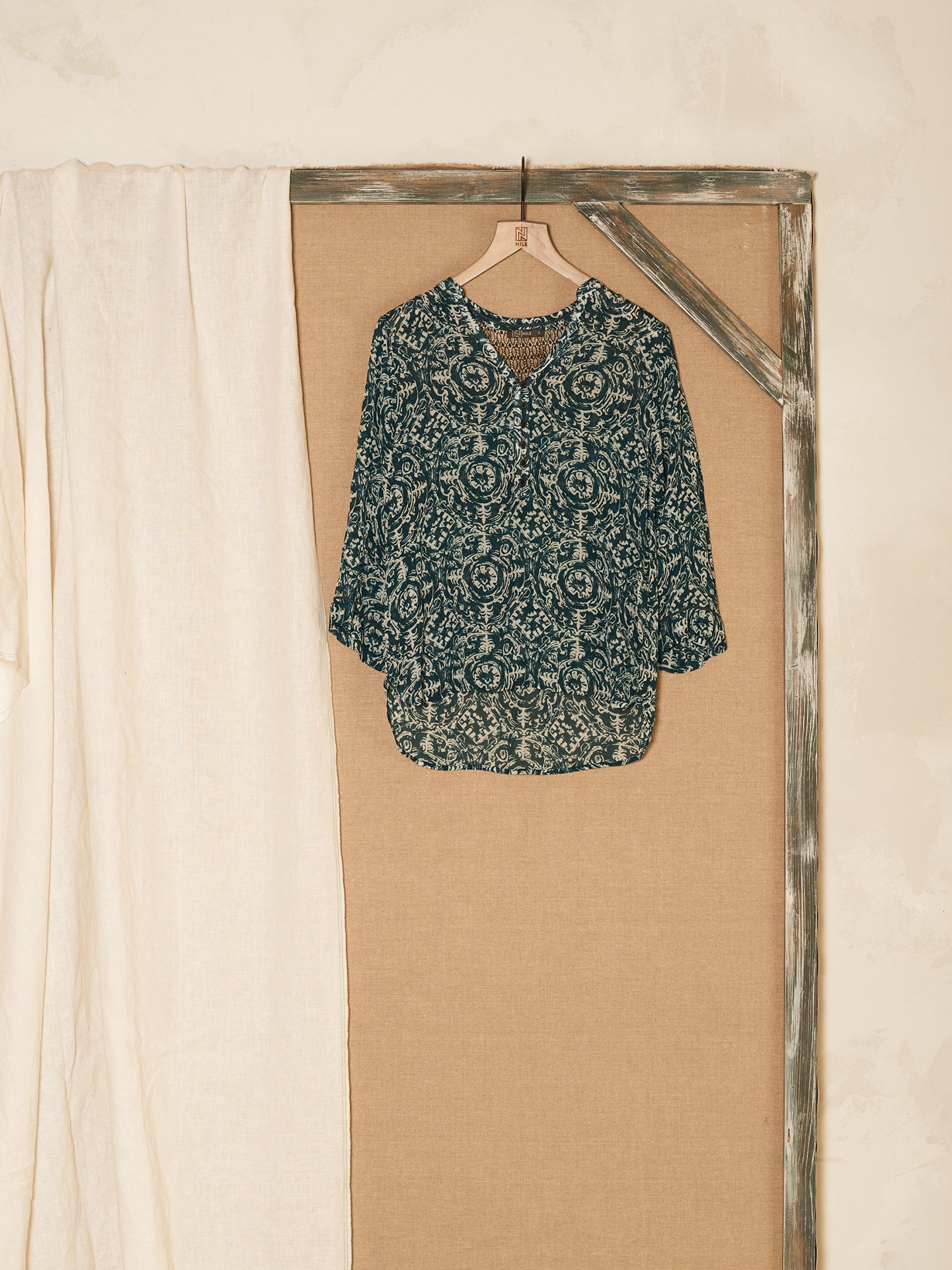 Blusa con abbottonatura