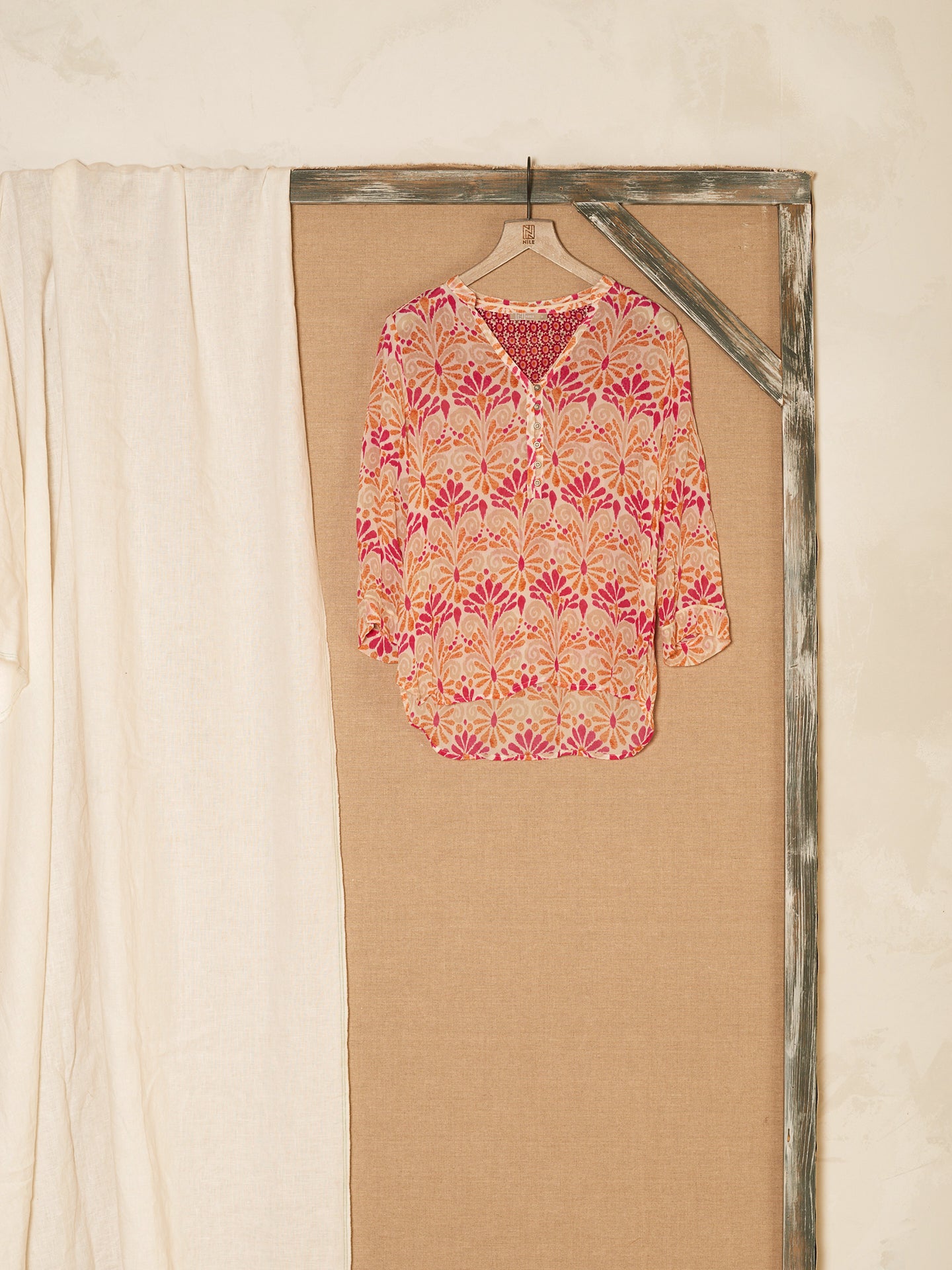 Blusa con abbottonatura