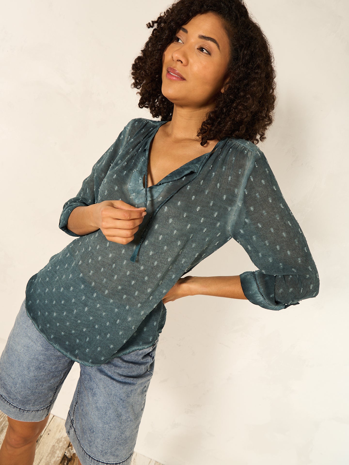Blusa con maniche a 3/4