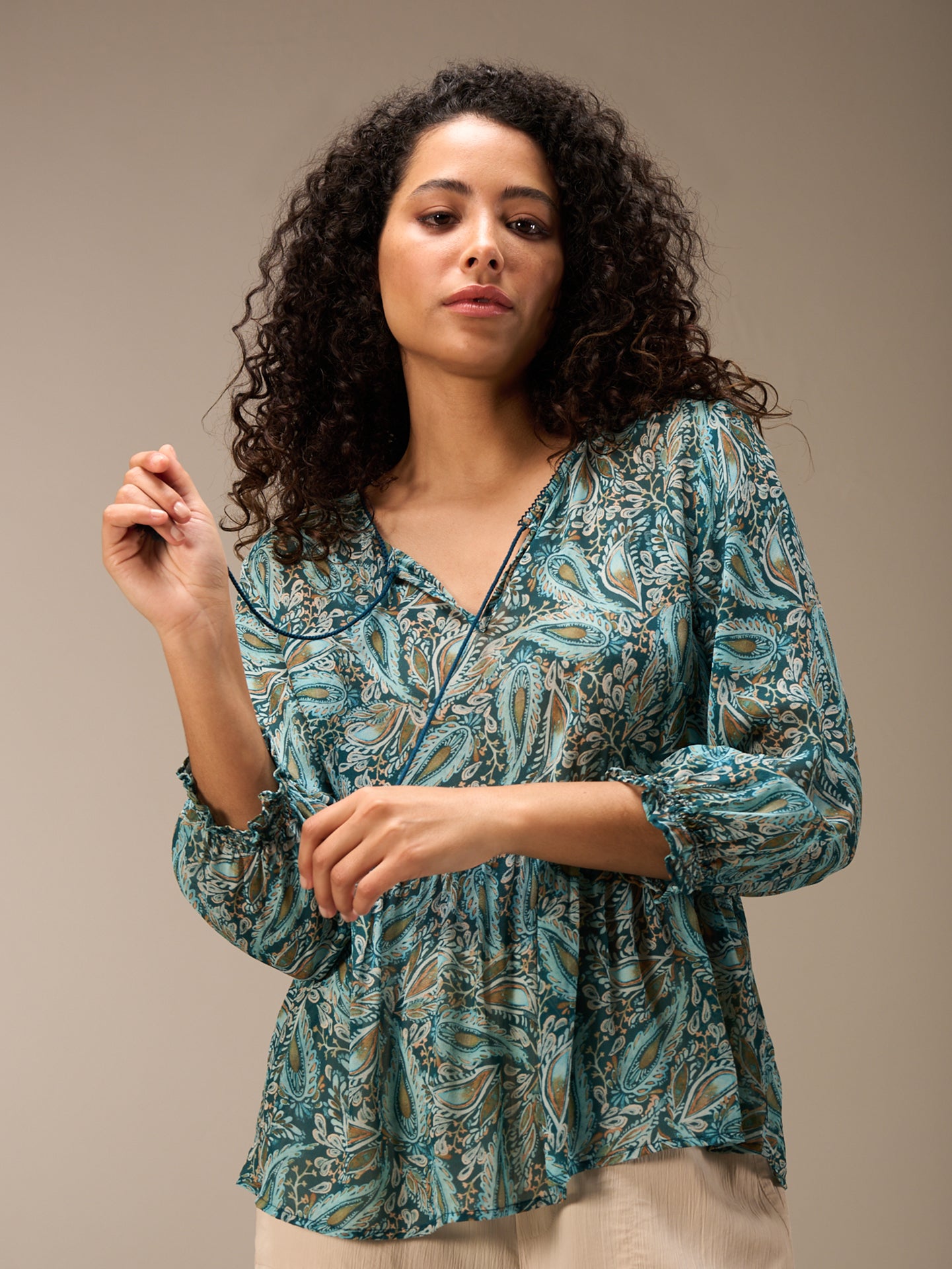 Blouse with flounce