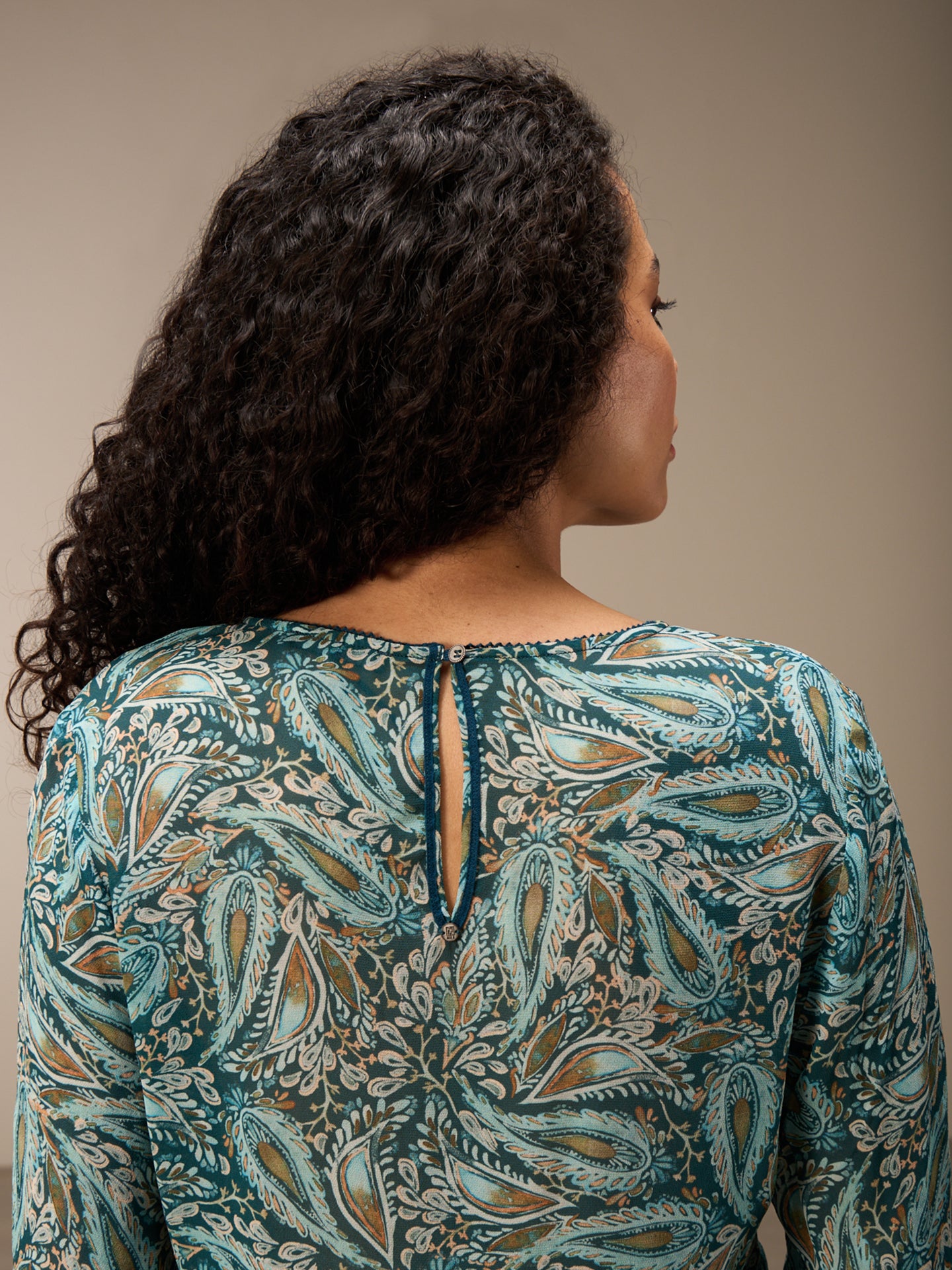 Blouse with flounce