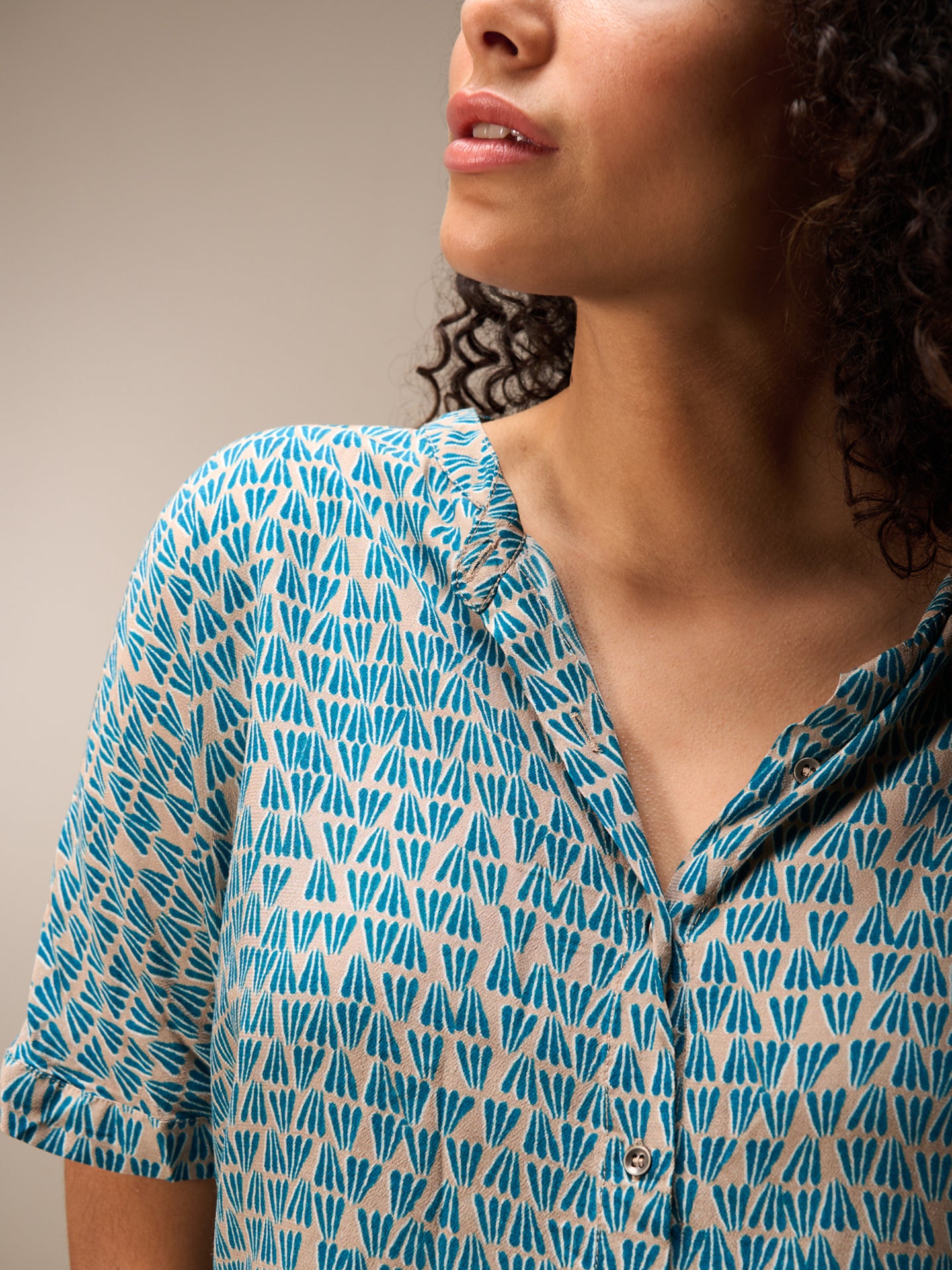 Blouse with stand-up collar