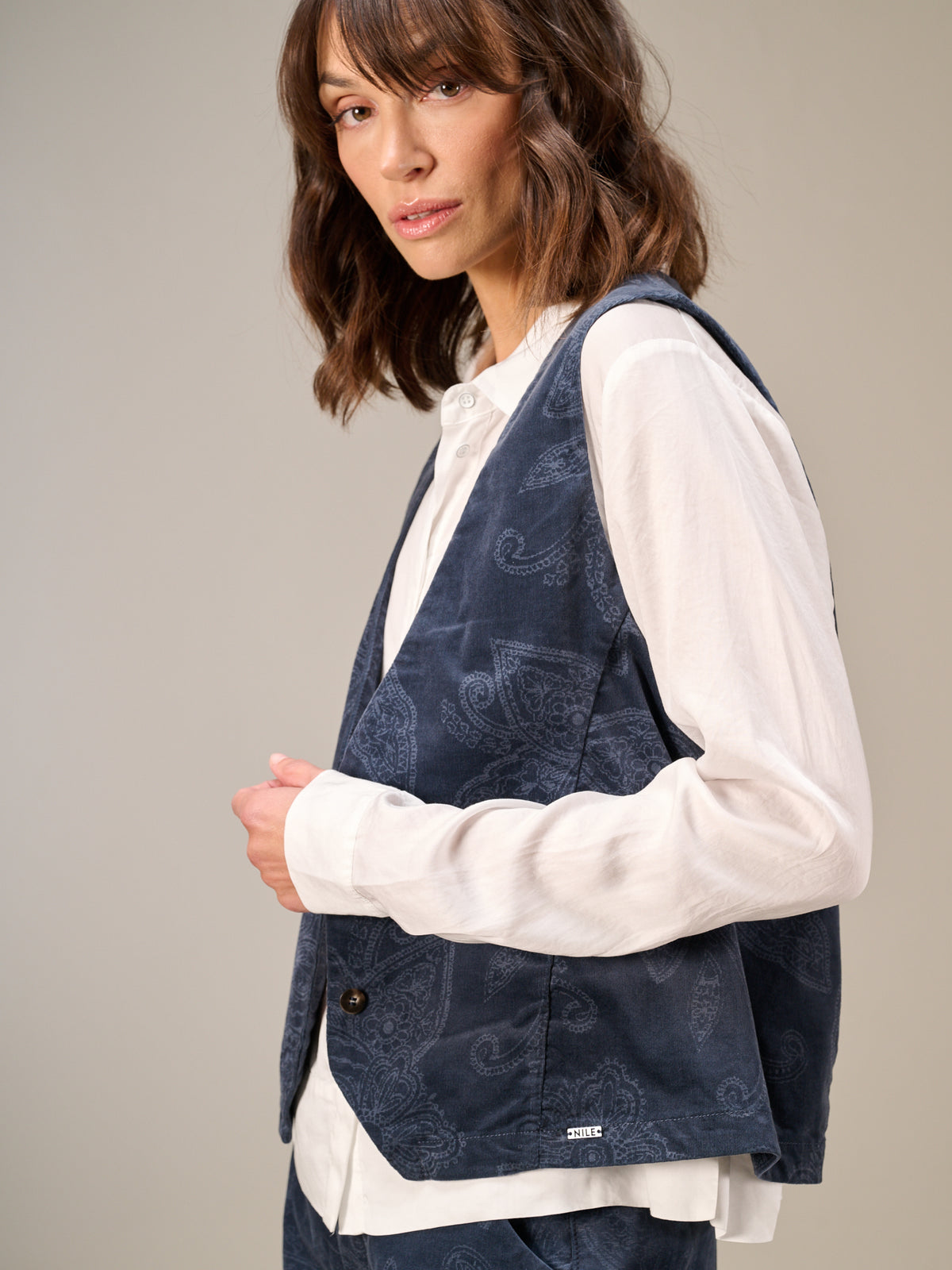 Gilet con chiusura con bottoni