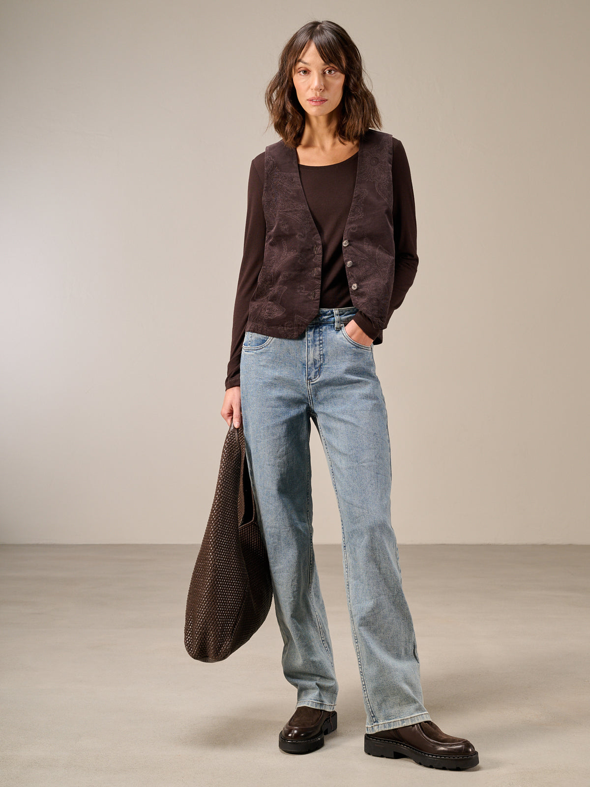 Gilet con chiusura con bottoni