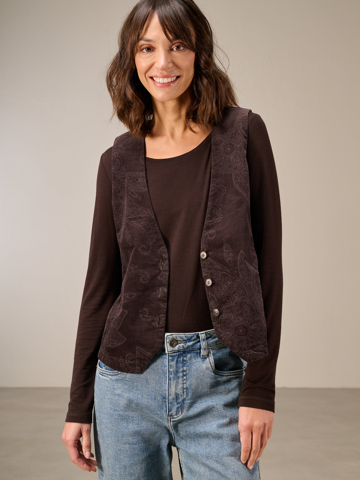 Gilet con chiusura con bottoni